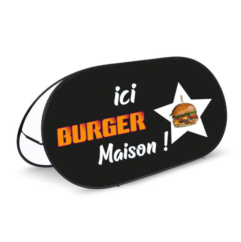Golf banner avec un fond noir et un burger maison ICI